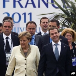 La chancelière allemande Angela Merkel et le président russe Dmitry Medvedev au sommet de Deauville