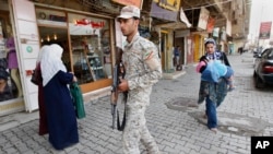 Iraqi Awakening Council member patrolling Azamiyah area of north Baghdad, April 3, 2010.