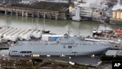 The Vladivostok warship docks in the port of Saint-Nazaire, western France, Dec. 7, 2014.