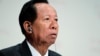 FILE - General Tea Banh, Cambodia's Defense Minister, waits for his turn to speak at 11th International Institute of Strategic Studies Asia Security Summit, in Singapore, June 2012.