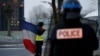 Macron Urges Calm; Paris Police Brace for More Violence
