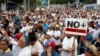 Quatre morts au Venezuela dans des troubles avant les manifestations 