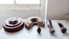 FILE - A portable display teaches children and farmers what landmines and hand grenades look like. (U. Filimonova/VOA)