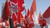 Opposition protesters with a placard depicting Czar Ivan The Terrible gathered during a rally in Moscow, Russia, March 10, 2012. 