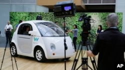 The Waymo driverless car is displayed during a Google event, Tuesday, Dec. 13, 2016, in San Francisco.