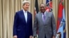 U.S. Secretary of State John Kerry stands with Kenyan President Uhuru Kenyatta before a bilateral meeting, at State House in Nairobi, Kenya, August 22, 2016.