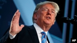 Presiden Donald Trump berbicara dalam perayaan 75 Tahun Federasi Nasional Bisnis Independen, 19 Juni 2018, di Washington.