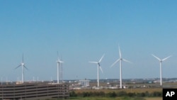 FILE - This Oct. 1, 2020, photo shows windmills at a utility plant in Atlantic City, N.J.