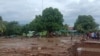 Sejumlah warga memeriksa kerusakan akibat banjir bandang di Flores Timur, Minggu, 4 April 2021. 