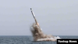 Korea Utara mengatakan telah berhasil melakukan uji coba rudal balistik dari kapal selam.