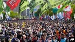 Miembros de la Confederación Coreana de Sindicatos se reúnen para una marcha del Primero de Mayo en Seúl, Corea del Sur, el miércoles 1 de mayo de 2024. 