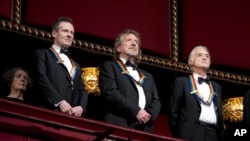 Rock band Led Zeppelin, from left, keyboardist/bassist John Paul Jones, singer Robert Plant, guitarist Jimmy Page, at the Kennedy Center Honors Gala, Washington, December 2, 2012. 