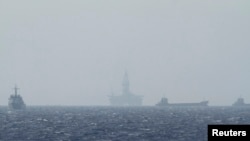 中國“海洋石油981”深海鑽井平台2014年5月14日在與越南有爭議的南中國海進行開發活動 (資料圖片)