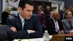  Food and Drug Administration (FDA) Commissioner Scott Gottleib looks over his notes before a House subcommittee hearing on the FDA's Status of Operations, Feb. 27, 2019, on Capitol Hill in Washington.