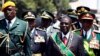 Zimbabwe's President Robert Mugabe arrives for the opening of parliament in Harare, Sept. 17, 2013.