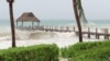Un muelle en Cozumel, México, antes de ser arrastrado por la tormenta tropical Gamma. Oct. 3 de 2020. Foto tomada de video de redes sociales de usuario @THE_KLUTE. 