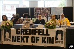 Faciada ölenlerin yaklaşık yarısının yakınlarını temsil eden Grenfell Akraba Grubu (GNK).