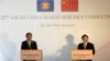 China's Foreign Affairs Vice Minister Liu Zhenmin (R) and Singapore's Foreign Affairs Permanent Secretary Chee Wee Kiong (L) brief the media after the 22nd ASEAN-China Senior Officials’ Consultations meeting in Singapore, April 28, 2016.