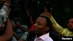 FILE - Nigerian journalist Omoyele Sowore speaks after being released on bail by Nigeria's government, in Abuja, Dec. 24, 2019. Since the coronavirus pandemic began, press freedom groups say security forces have assaulted journalists covering the issue.