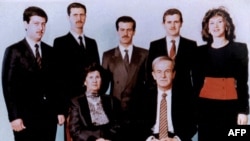 (FILES) - A family picture dated 1985 shows Syria's late president Hafez al-Assad and his wife Anissah Makhlouf (seated) and, behind them, from R to L their five children: Bushra, the late Majd, the late Bassel (1962-94), deposted president Bashar, and th