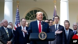 Le président Donald Trump annonce un accord de libre-échange remanié à la Maison Blanche à Washington, le 1er octobre 2018.