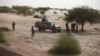 FILE - United Nations peacekeepers patrol on the outskirts of Timbuktu, Mali, July 23, 2013.