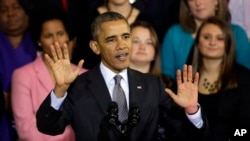President Barack Obama speaks about the federal health care law, at historic Faneuil Hall in Boston, Oct. 30, 2013.