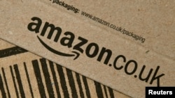FILE - An Amazon package is seen after being delivered in London, Britain, Feb. 29, 2016.