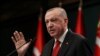 Turkish President Tayyip Erdogan talks during a news conference following a cabinet meeting in Ankara, Turkey, Nov. 30, 2020.