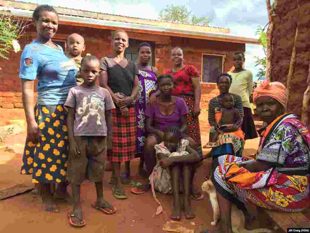 Charity Mwangome with family and friends at her farm, in Taita-Taveta area, Kenya, April 19, 2016.