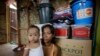 Typhoon survivor Emily Sagalis poses with baby Bea Joy inside her modest home near the Philippines’ coastal City of Tacloban, Nov.5, 2014. Bea Joy was named for her grandmother, Beatrice, who died in the storm.