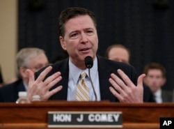 FILE - FBI Director James Comey testifies on Capitol Hill in Washington, March 20, 2017, before the House Intelligence Committee hearing on allegations of Russian interference in the 2016 U.S. presidential election.