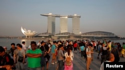 Para turis di Marina Bay, Singapura. 