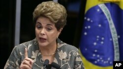 FILE - Brazil Political Crisis: Brazil's suspended President Dilma Rousseff speaks at her own impeachment trial, in Brasilia, Brazil, Monday, Aug. 29, 2016.