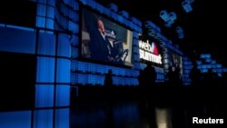 Cosmologist Stephen Hawking delivers a video message during the inauguration of Web Summit, Europe's biggest tech conference, in Lisbon, Portugal, Nov. 6, 2017. 
