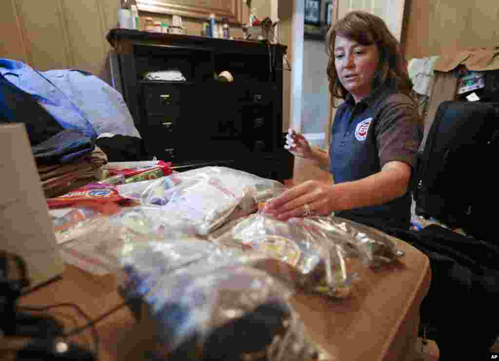 Rendi Murphree, an epidemiologist with the Centers for Disease Control and Prevention packs for her trip&nbsp;to Monrovia, Liberia, at her home in Nashville, Tennessee, &nbsp;Sept. 5, 2014.&nbsp;