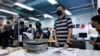 4 Journalists at Shut Hong Kong Paper Charged with Collusion 