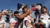 Supporters of 14 detained students protest outside the military court in Bangkok, Thailand, July 7, 2015.