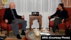 Presiden Afghanistan Hamid Karzai dan penasihat keamanan nasional AS Susan Rice di Kabul (25/11).