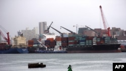 Des cargos au port de Durban, en Afrique du Sud, le 25 mars 2013. (AFP / JEAN LIOU)