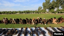 ISIS militants who surrendered to the Afghan government are presented to media in Jalalabad, Nangarhar province, Afghanistan November 17, 2019. REUTERS/Parwiz TPX IMAGES OF THE DAY
