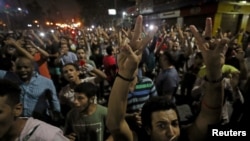 Protesters gather in central Cairo shouting anti-government slogans in Cairo, Egypt, Sept. 21, 2019.
