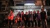 Boeng Kak community activists pose in a group photo after the release of their activists in front of Phnom Penh's Daun Penh district police, after they were questioned on “Black Monday” protest on Monday 9th, May 2016. ( Leng Len/VOA Khmer)