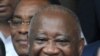 Ivory Coast President Laurent Gbagbo with supporters 16 October 2009 in Abidjan after he submitted his candidacy for presidential elections