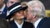 President-elect Donald Trump kisses Melania Trump before the 60th Presidential Inauguration in the Rotunda of the U.S. Capitol in Washington, Jan. 20, 2025. 