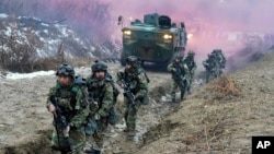 FILE - U.S. Army soldiers march during a joint military drill of South Korea and the United States in Paju, South Korea, Friday, Jan. 13, 2023. (AP Photo/Ahn Young-joon)