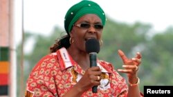 Zimbabwe's First Lady Grace Mugabe addresses her maiden political rally in Chinhoyi after she was nominated to head the Zanu PF ruling party women's league two months ago, Oct. 2, 2014. 