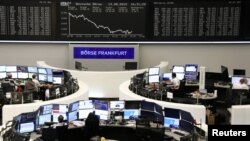FILE - A board above the floor of the New York Stock Exchange shows the closing number for the Dow Jones industrial average, Aug. 13, 2019. 