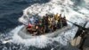 FILE - A crew of U.S. sailors and Nigerian special forces fighters prepares to board the NNS Burutu for a training exercise as worries mount of increasingly violent pirate attacks along the West African coast.