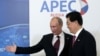 Russia's President Vladimir Putin greets China's President Hu Jintao upon his arrival at the APEC Summit in Vladivostok September 8, 2012. 